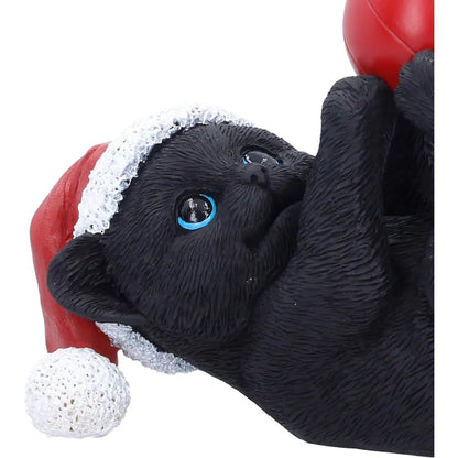 BLACK CAT IN SANTA HAT PLAYING WITH BAUBLE FIGURE