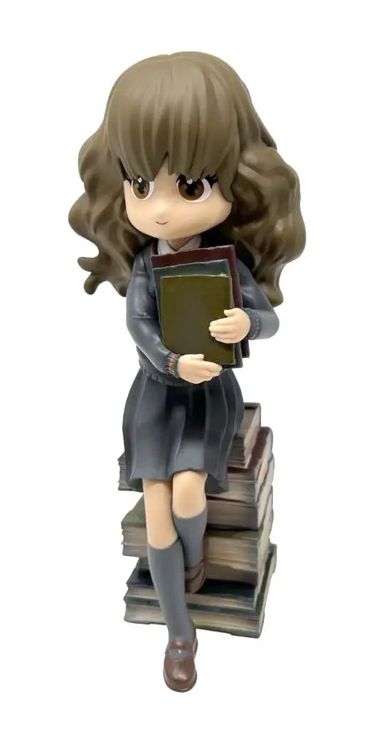 HP HERMIONE ON PILE OF SPELL BOOKS FIGUR